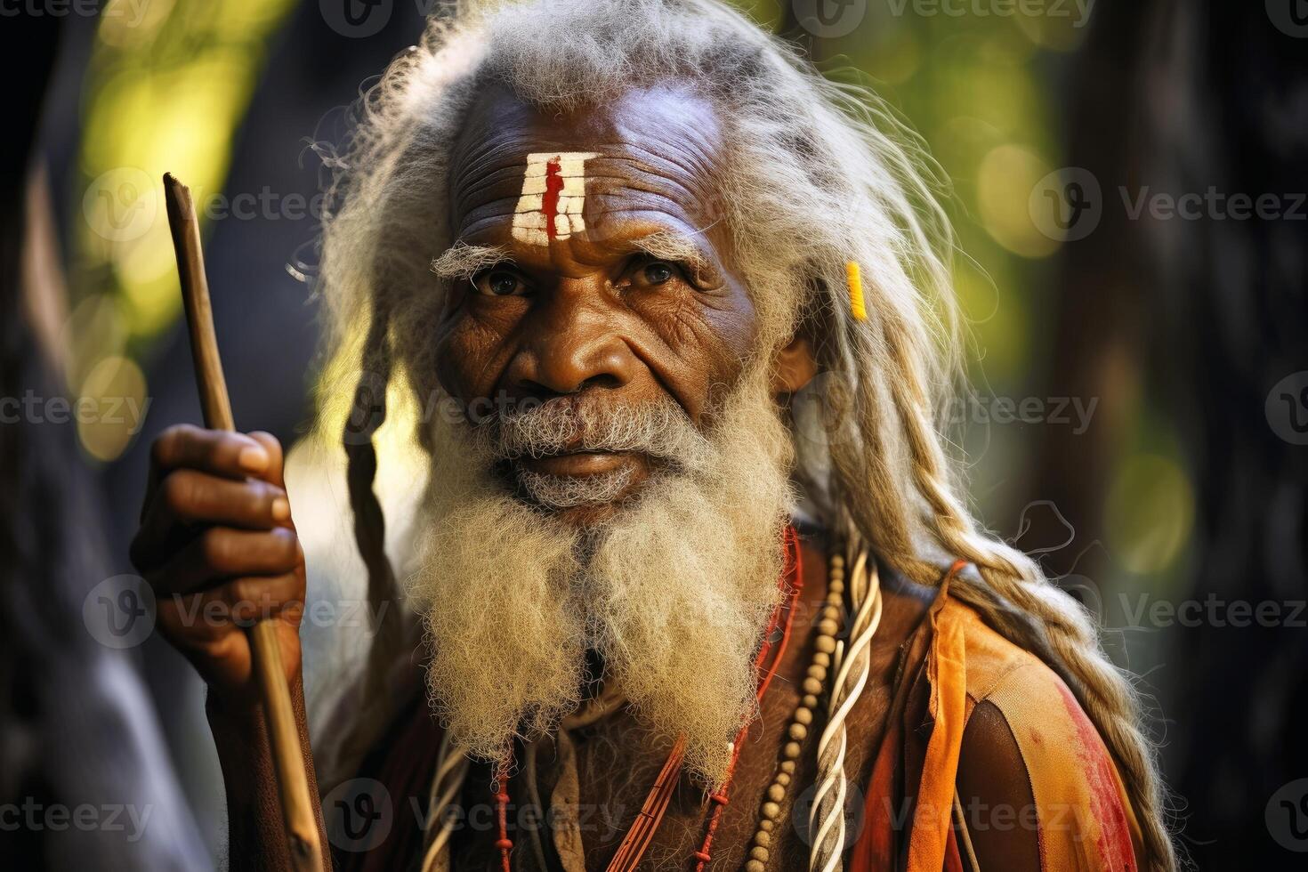 An Australian Aborigine in traditional robes created with technology. photo