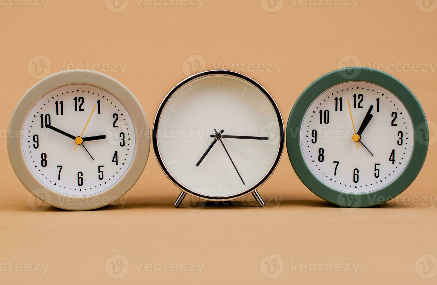 Alarm clock. Beautiful modern clock lies on paper background. time clock time standstill time off work working with time time concept photo