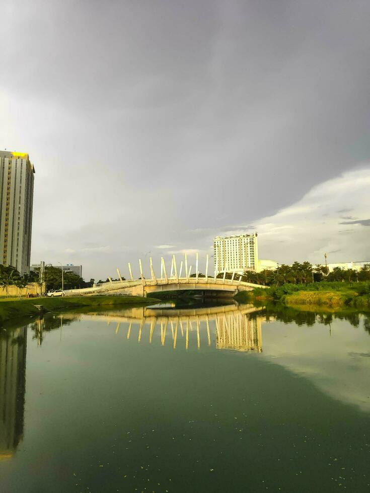 the view of the skyscrapers from the lake side in the evening photo