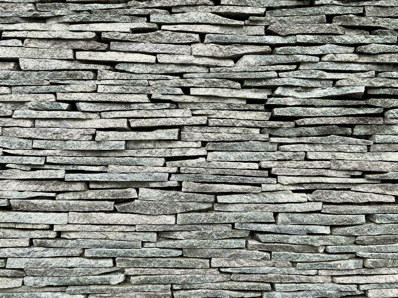 Stacked stone wall background horizontal photo