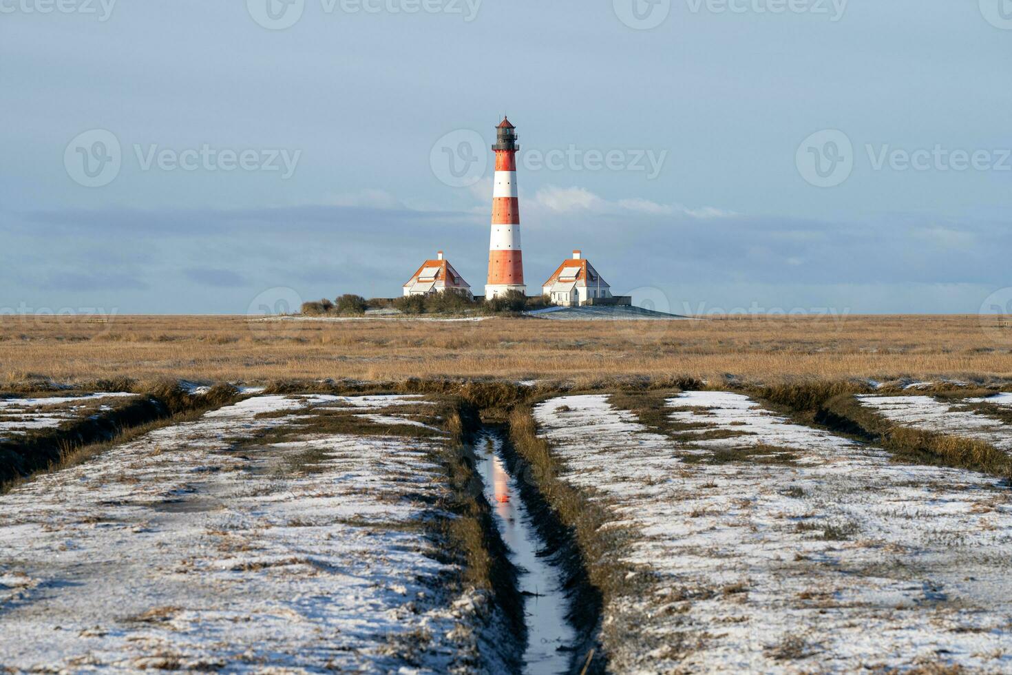 Lighthouse of Westerhever, North Frisia, Germany photo