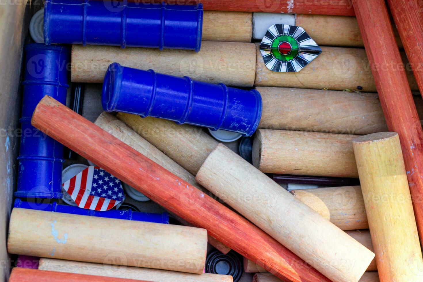 Wooden and blue plastic tubes sports equipment. photo