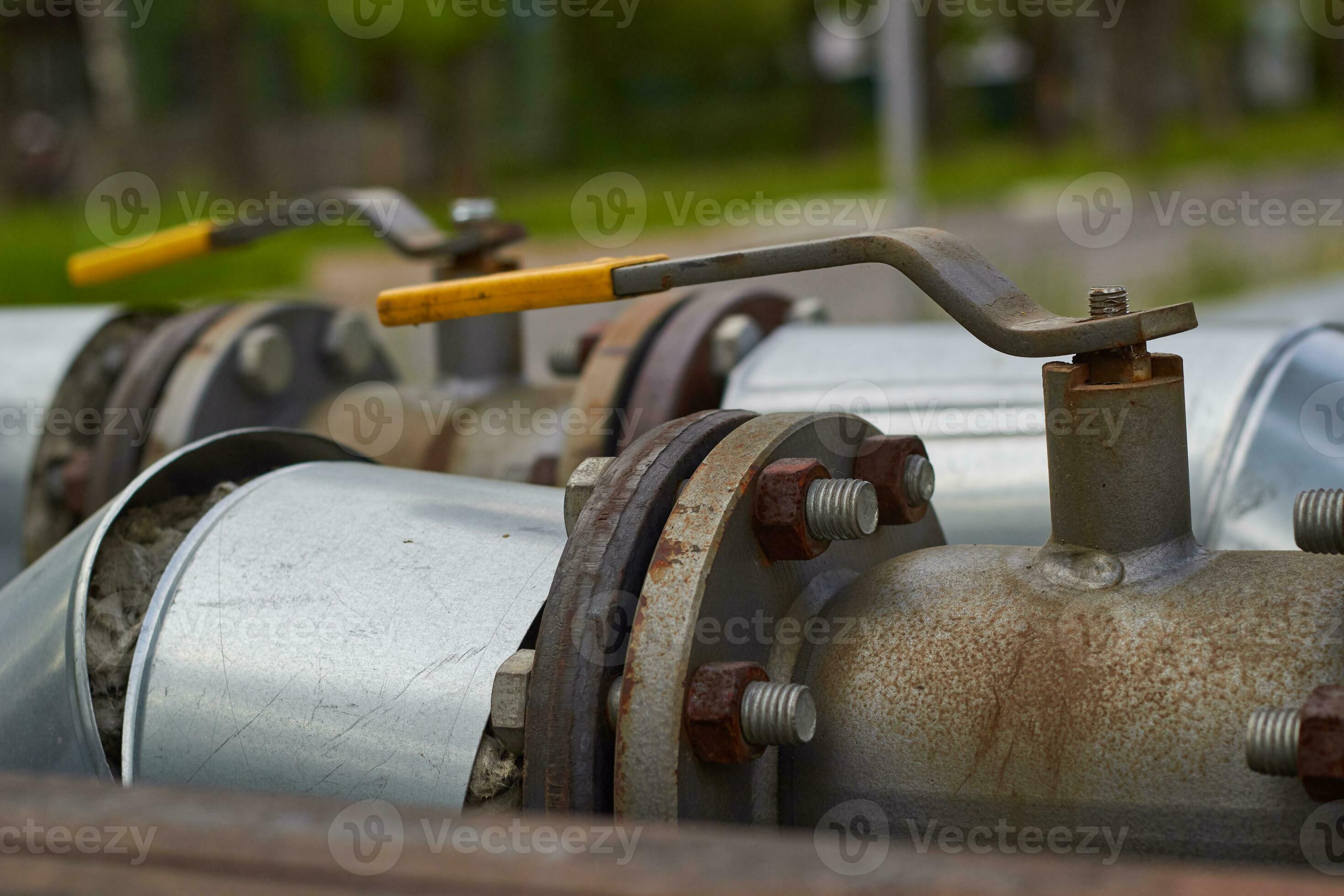 Photo of metal gas pipes with taps. 26162278 Stock Photo at Vecteezy