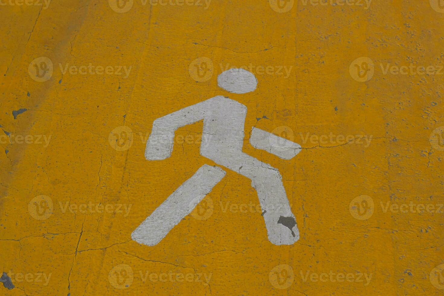 white man on yellow background road markings photo