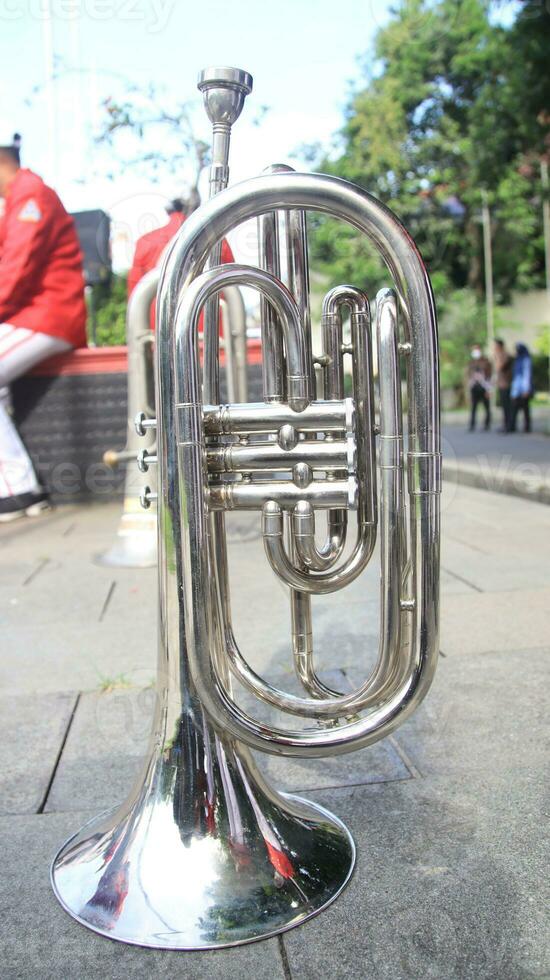 Close up on a valve section of a professional trumpet photo