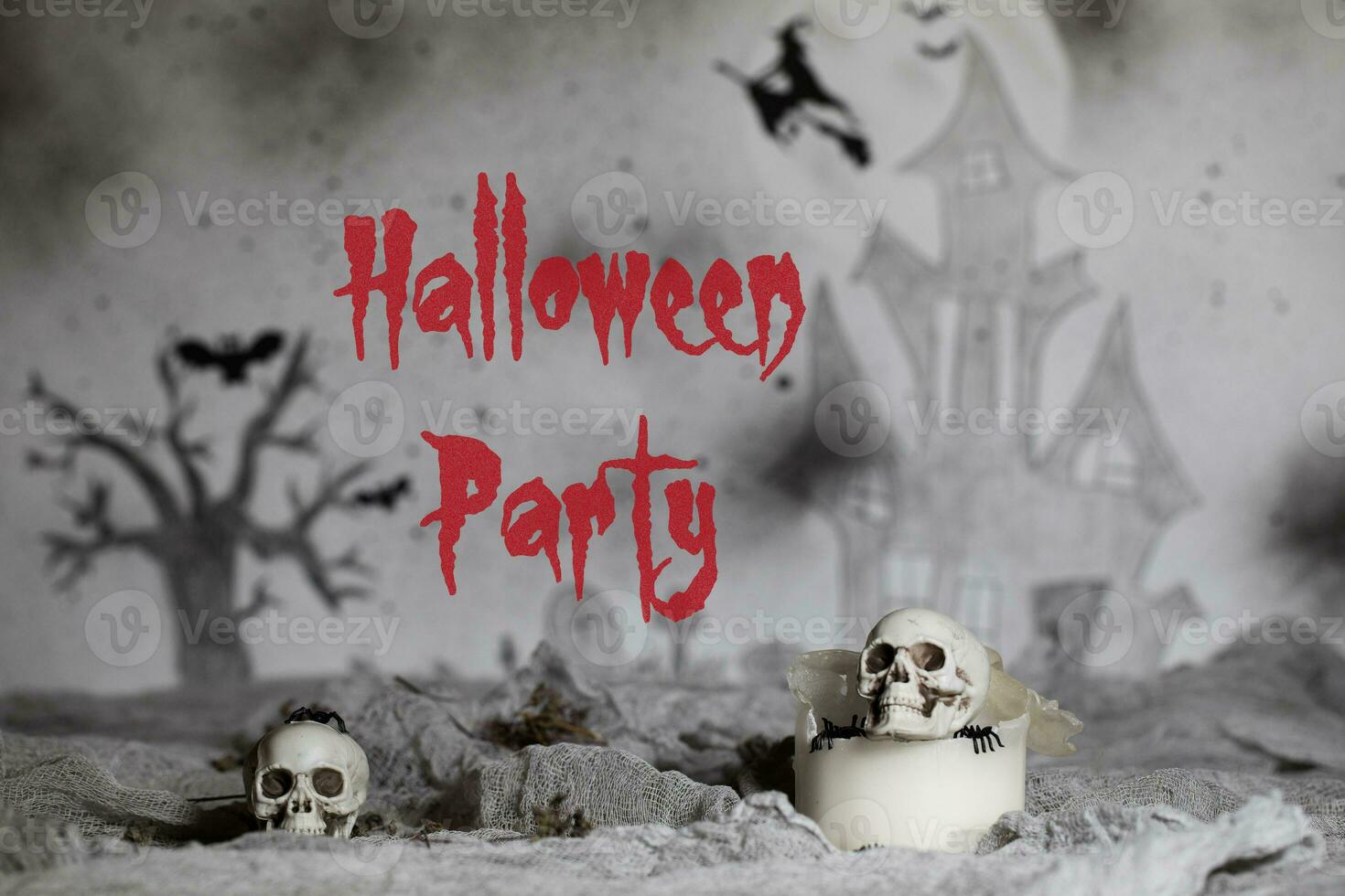 Halloween Party. Skull on an old used thick candle. Scary Halloween background. photo