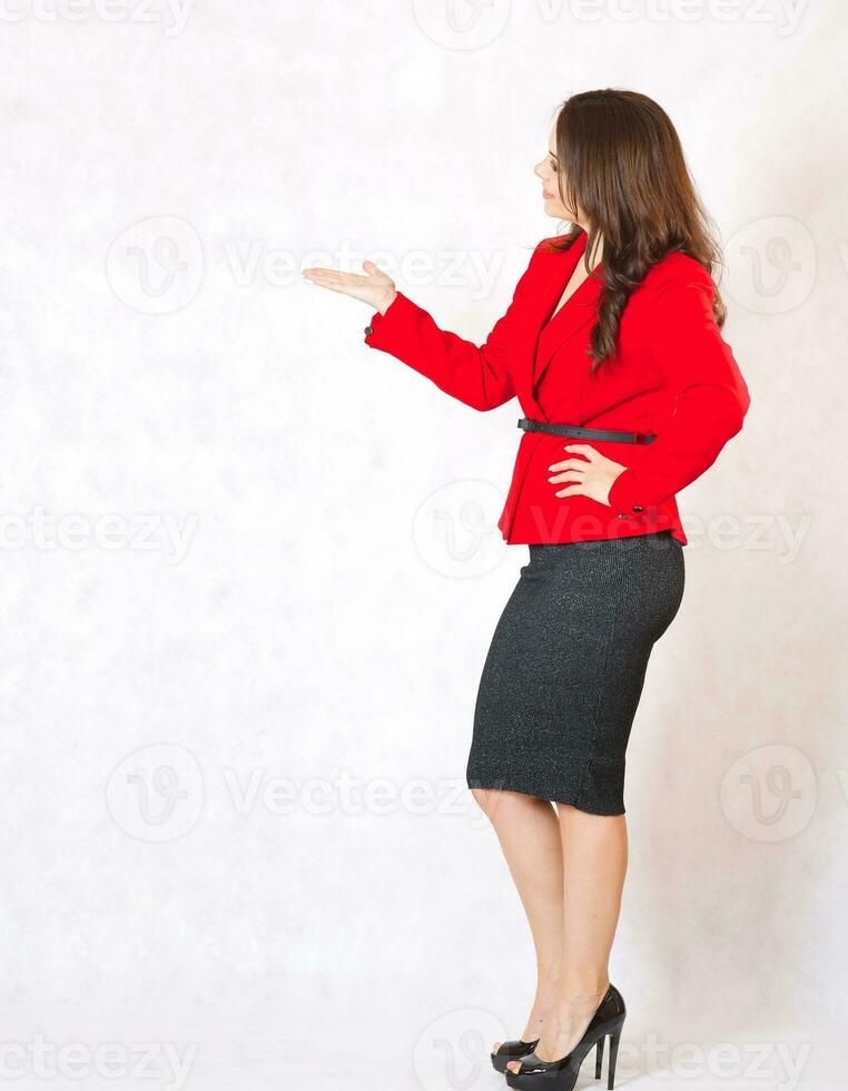 A young woman shows her solution photo