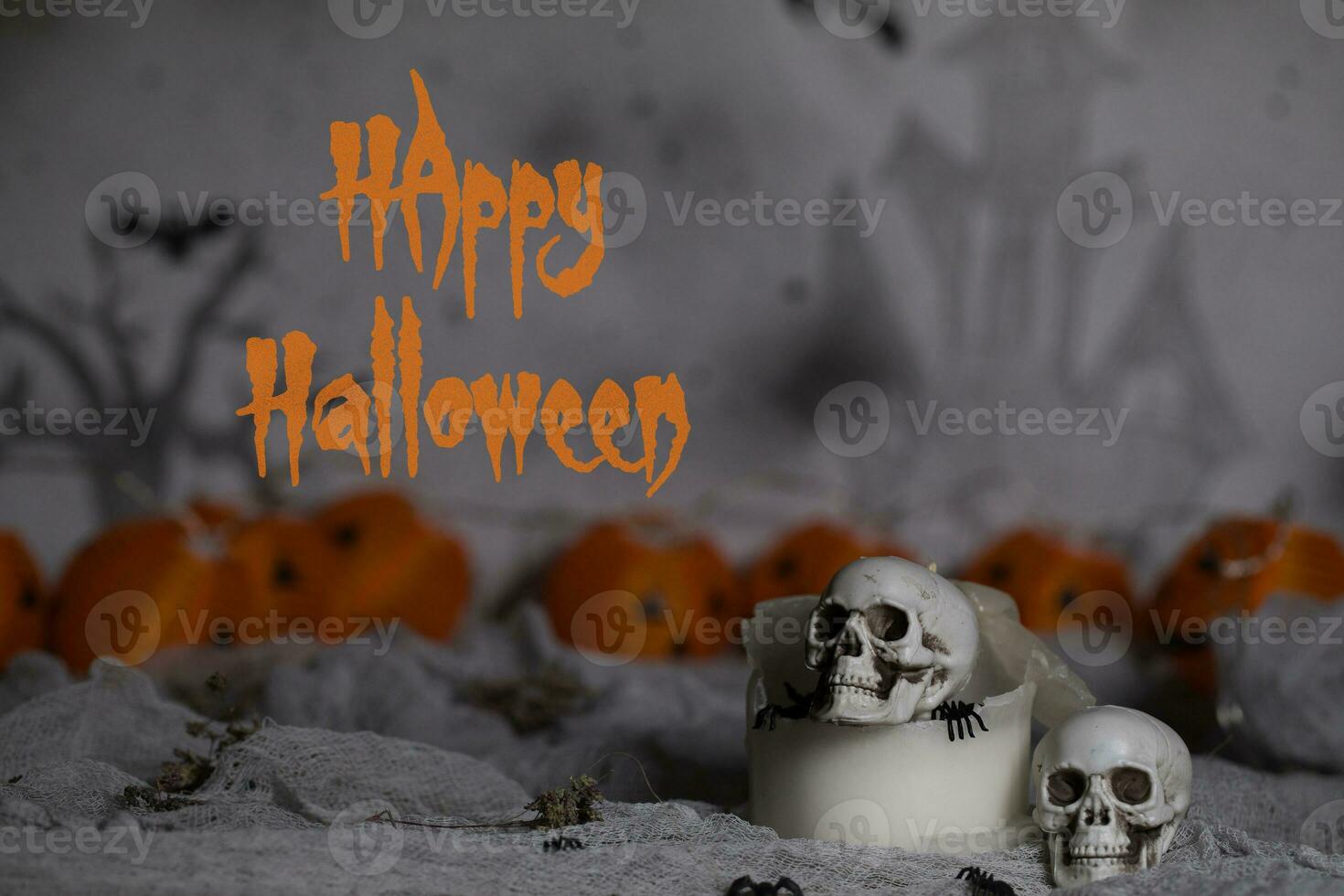 Happy Halloween. Skull on an old used thick candle. Scary Halloween background. photo