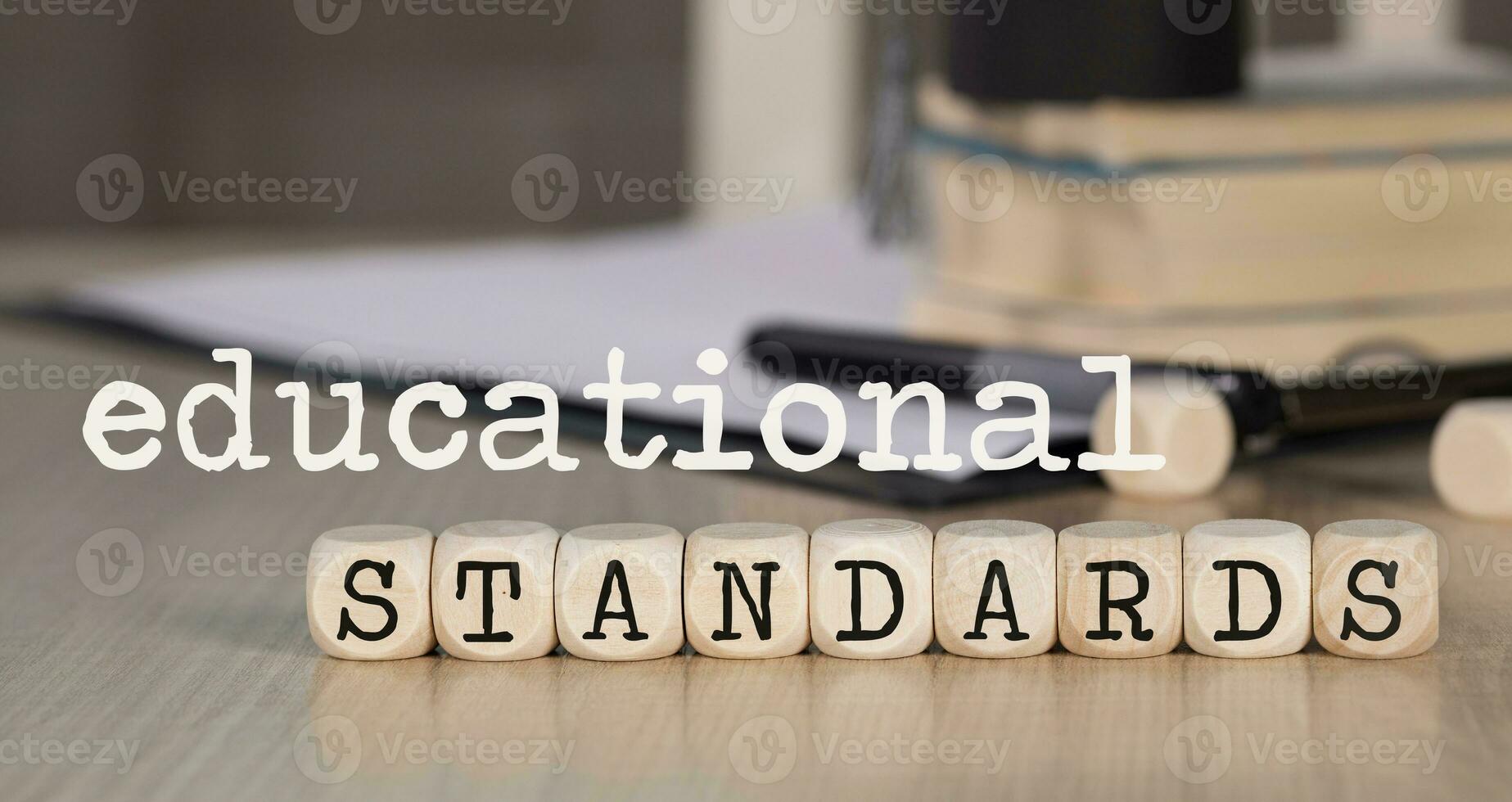 Words  EDUCATIONAL STANDARDS composed of wooden dices. photo