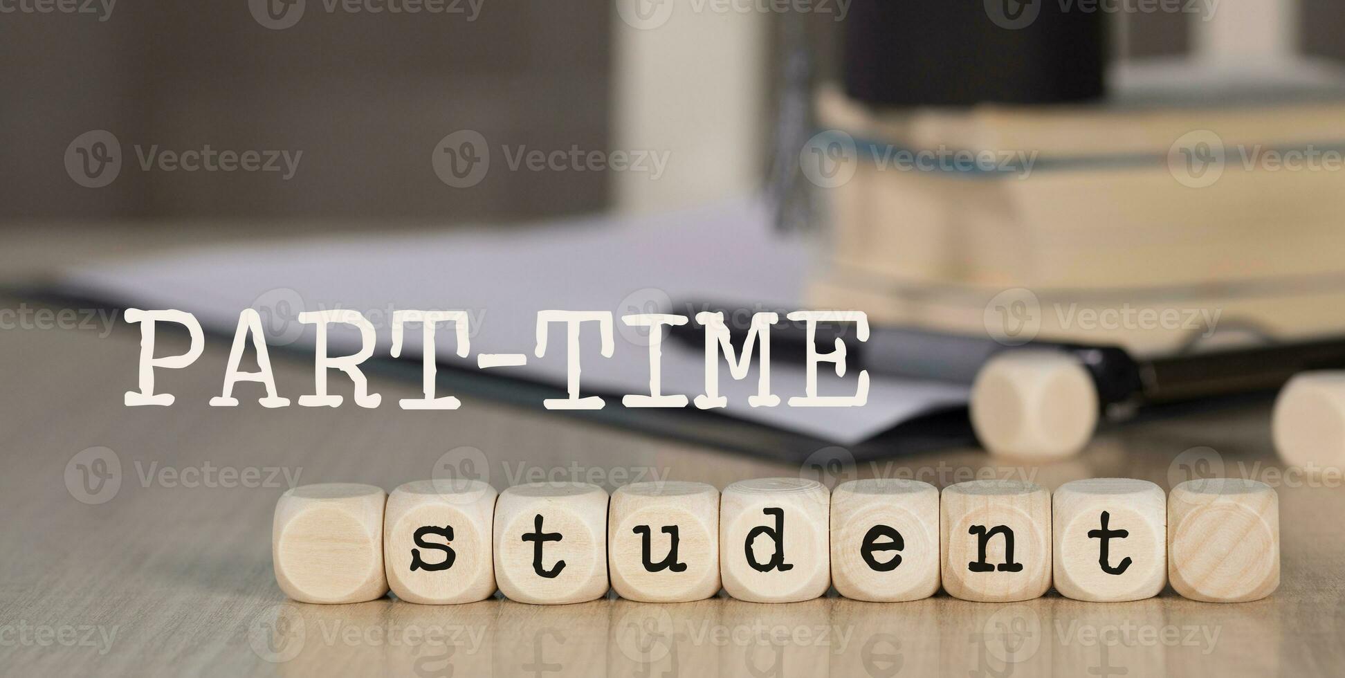 Words PART-TIME STUDENT composed of wooden dices. photo
