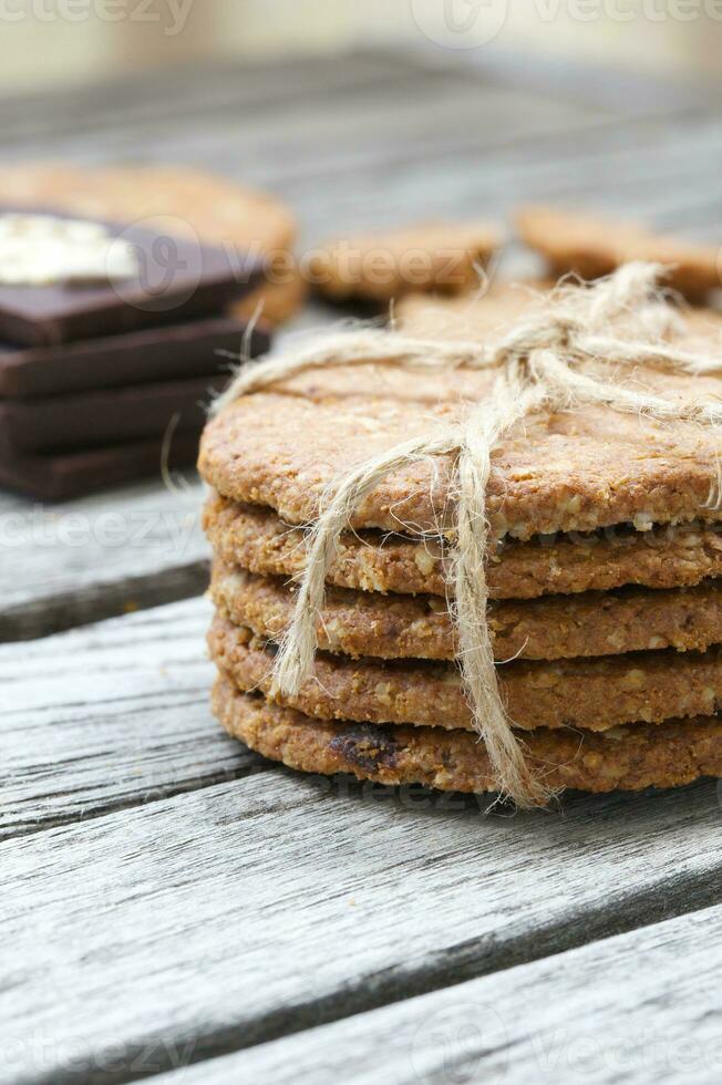 Fitness oat biscuits on an old wooden surface. Closeup photo