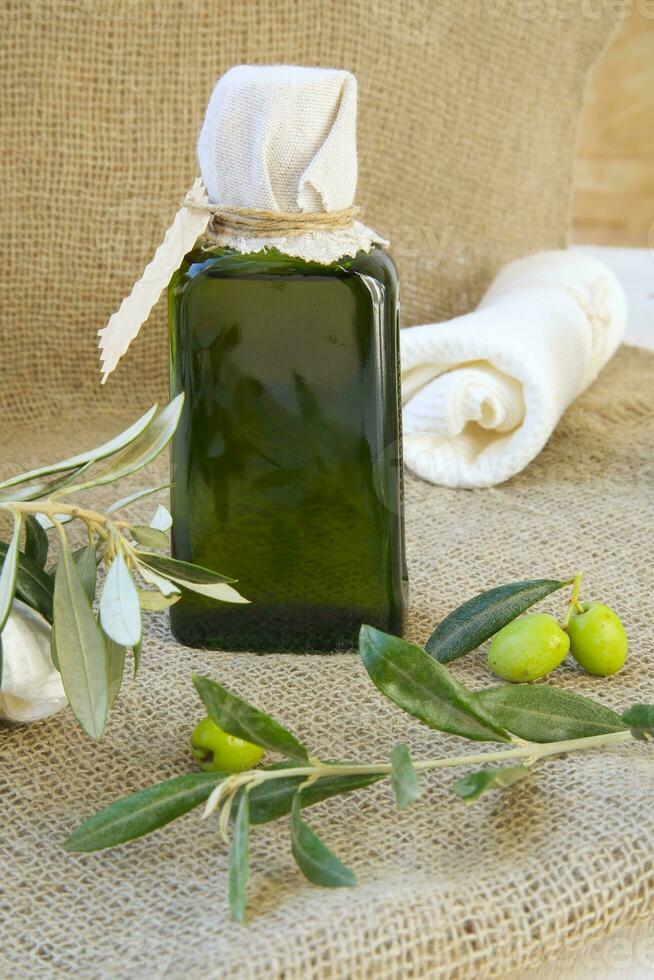 A bottle of extra virgin olive oil. photo