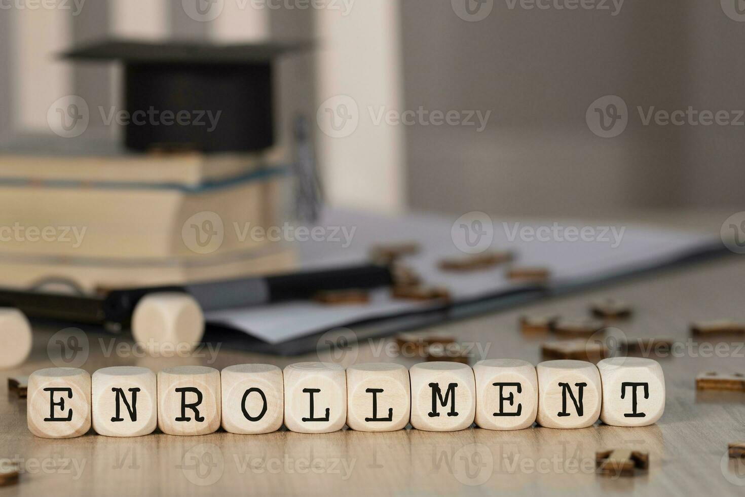 Word ENROLLMENT composed of wooden dices. photo