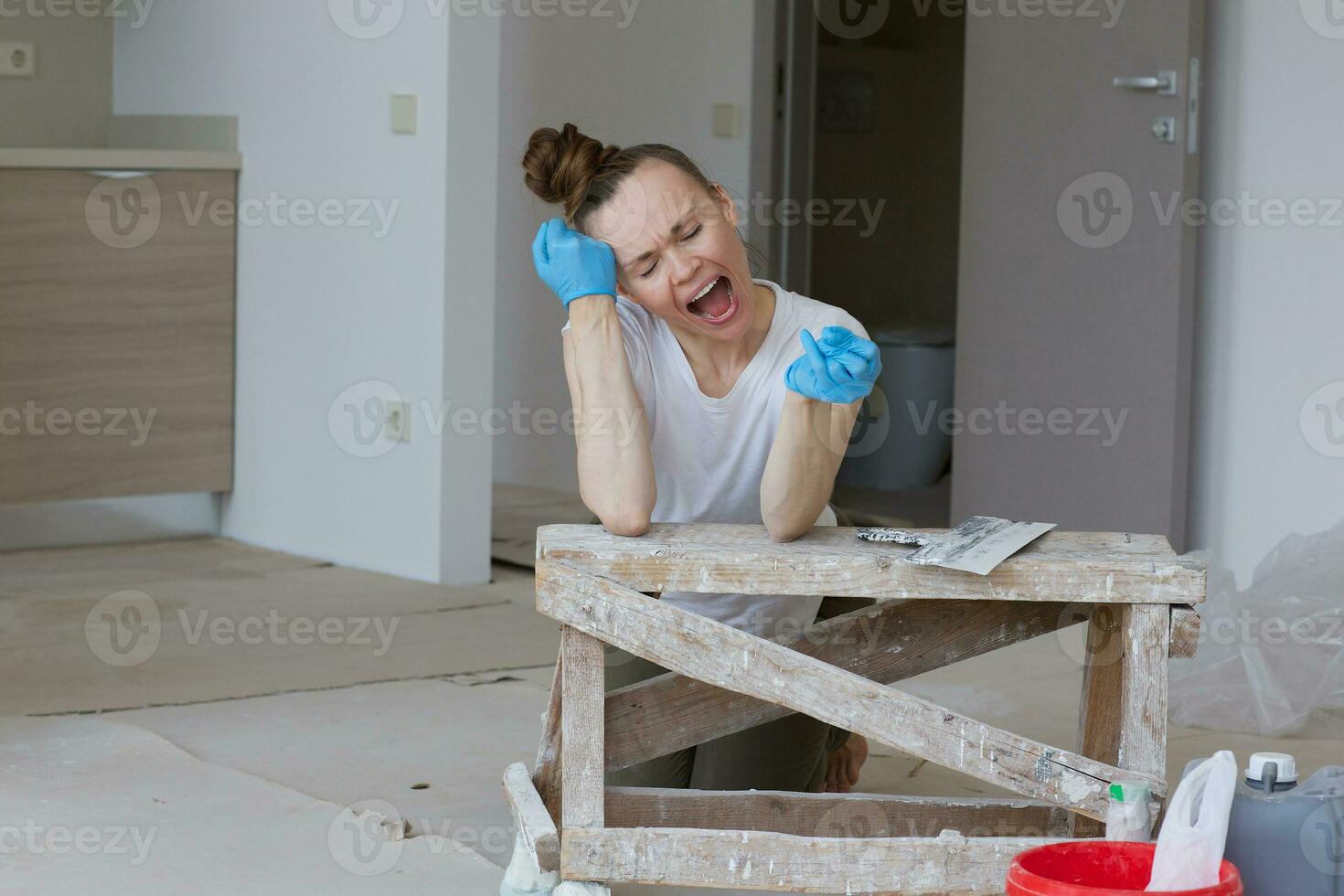 Young lady renovates  apartment photo