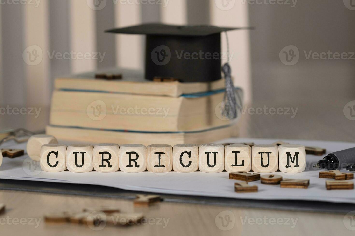 Word CURRICULUM composed of wooden dices. photo