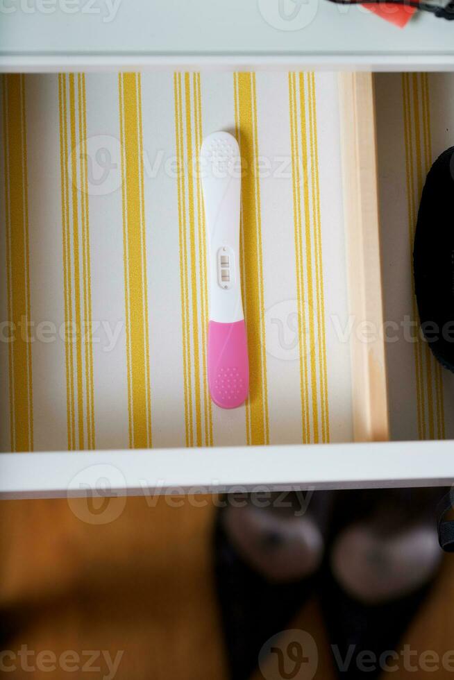 Open drawer of a woman's mirror table. photo