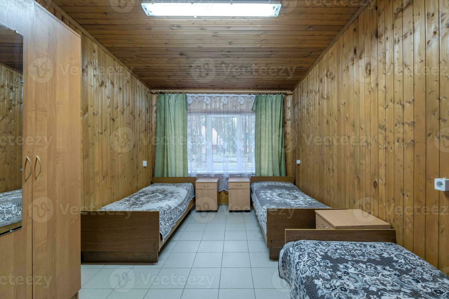 interior of wooden eco bedroom in studio apartments,  hostel or homestead photo