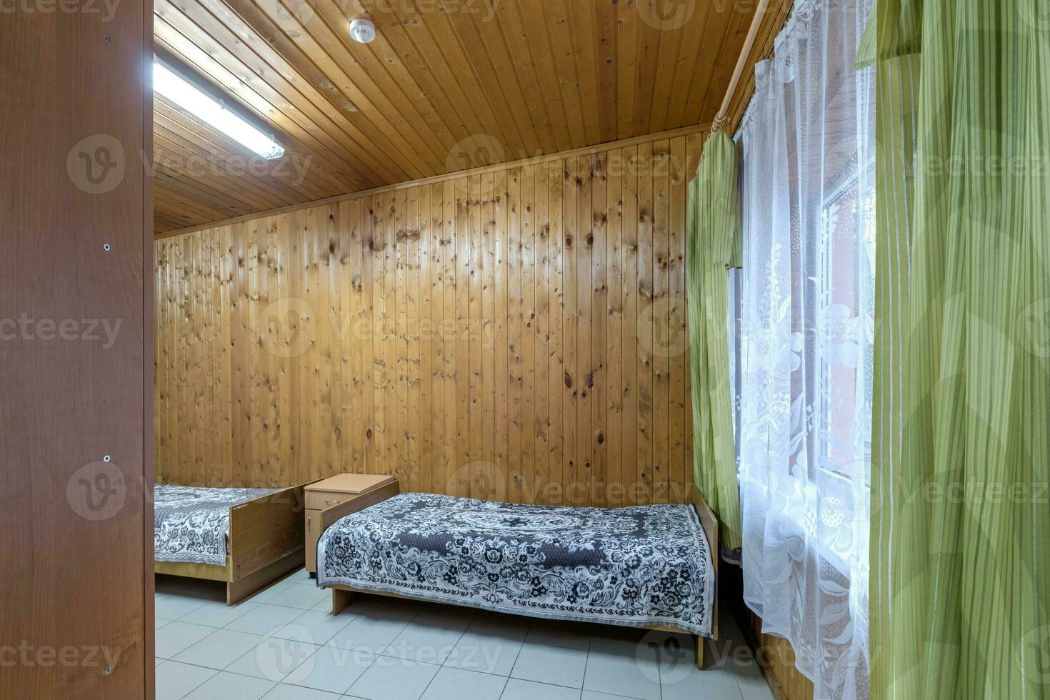 interior of wooden eco bedroom in studio apartments,  hostel or homestead photo