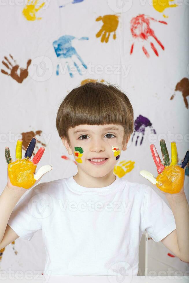 Boy is painting something. photo