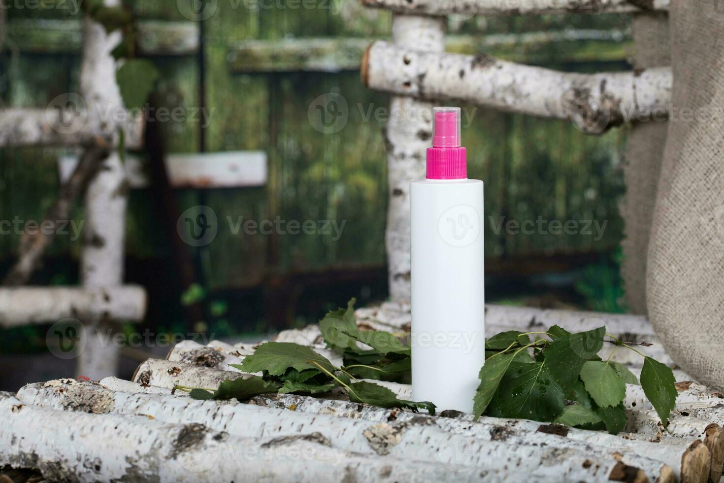 Skin and hair care birch sap water in a plastic bottle. photo