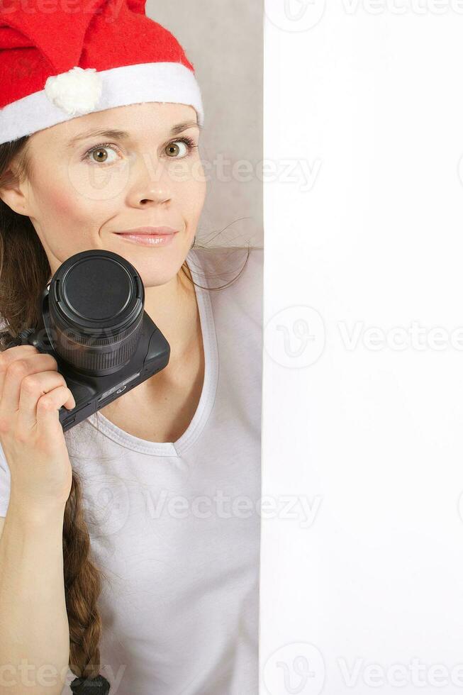 Young lady with a camera photo