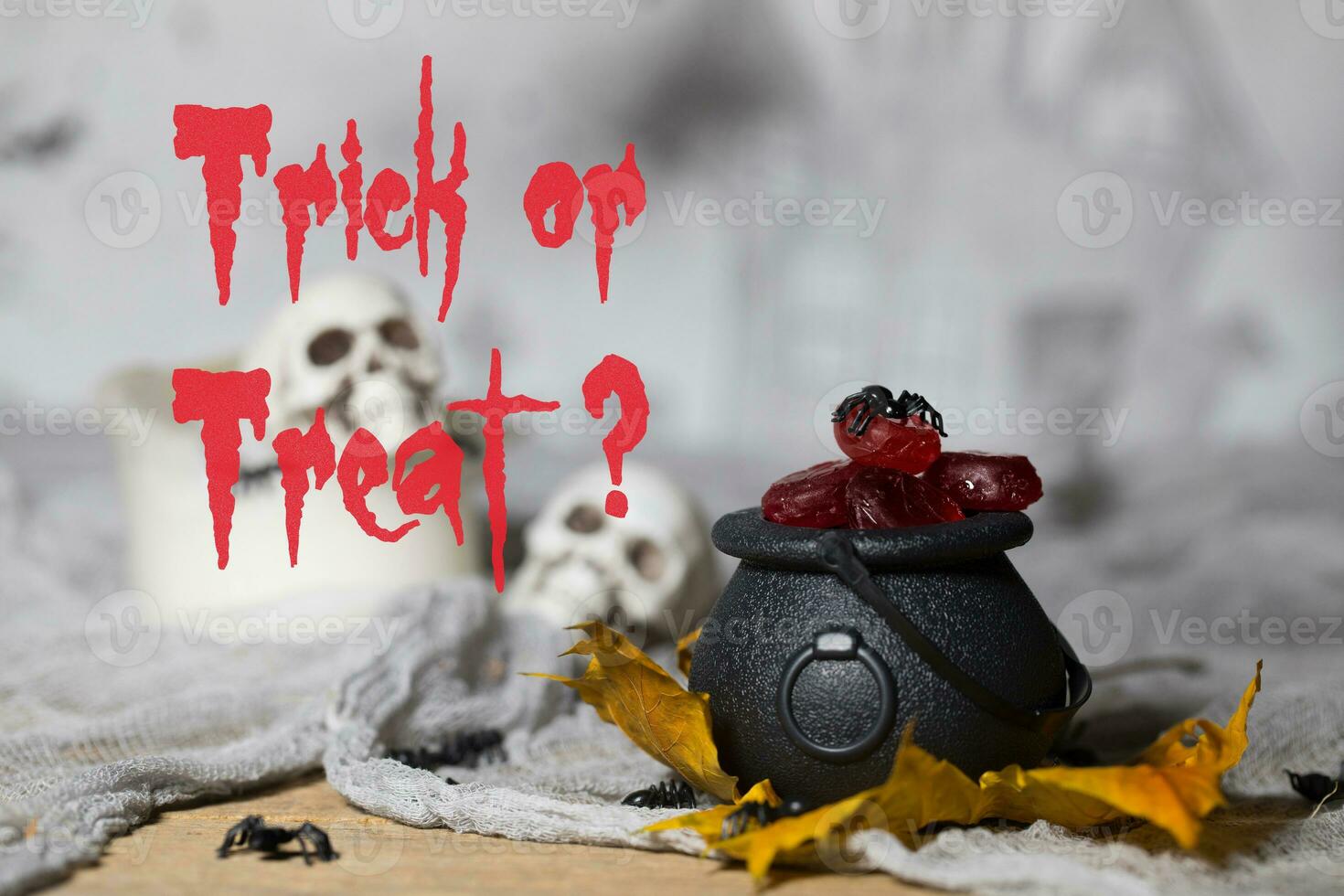 Trick or treat - Candies in cauldrons for Halloween. photo