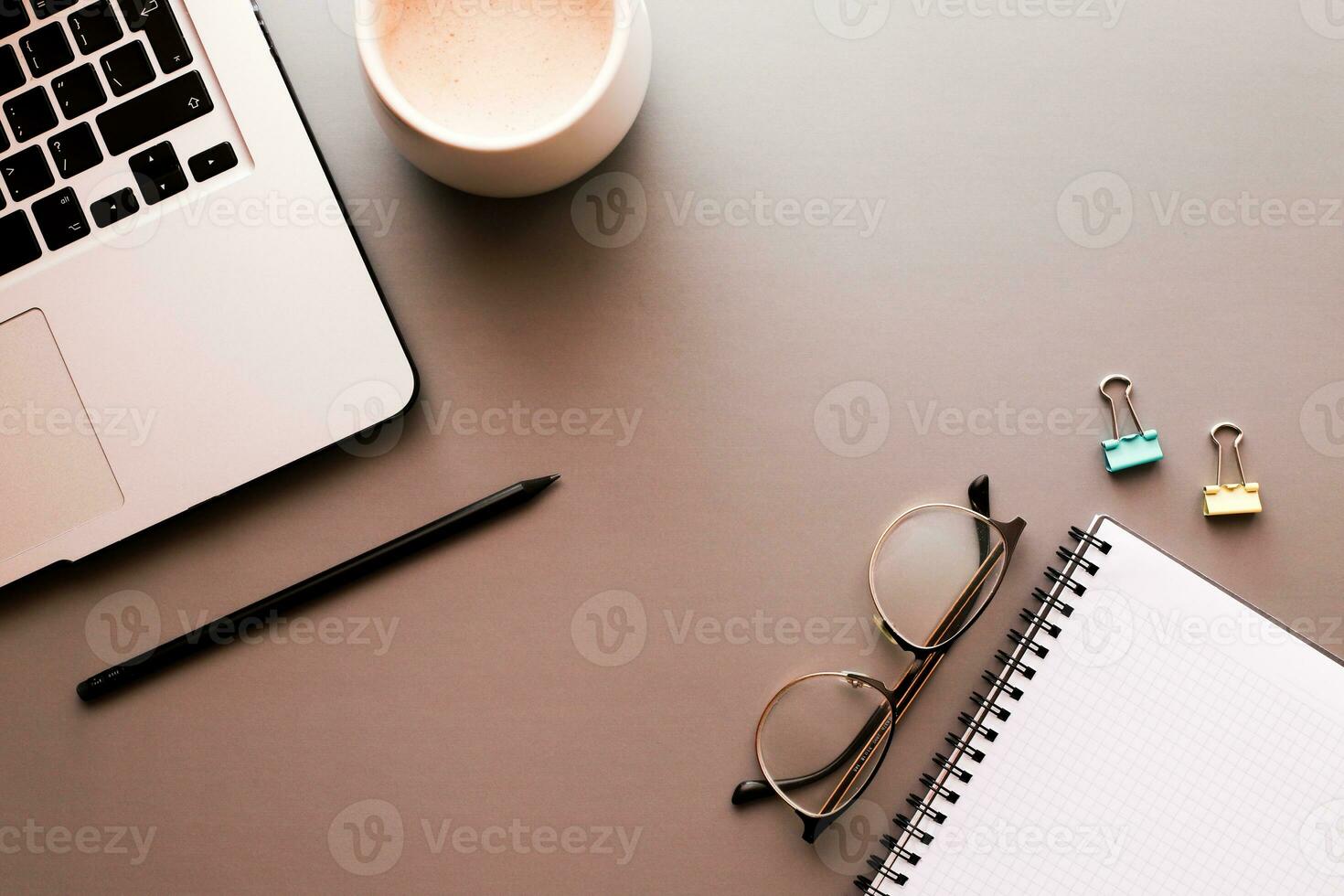 Flat lay desktop on a gray background. Business, education, freelance photo