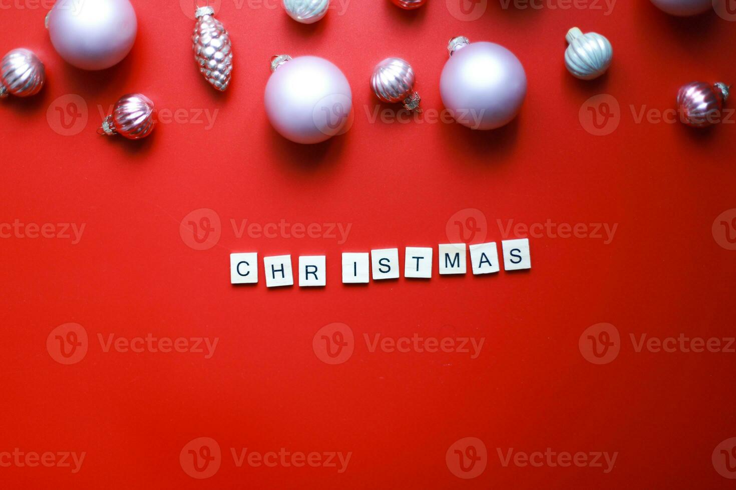 Flat lay word christmas from wooden letters. Flatly Christmas toys for the Christmas tree photo