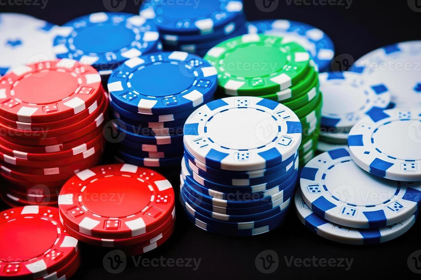 Stacks of Colorful Casino Chips - Gambling and Entertainment Concept - photo