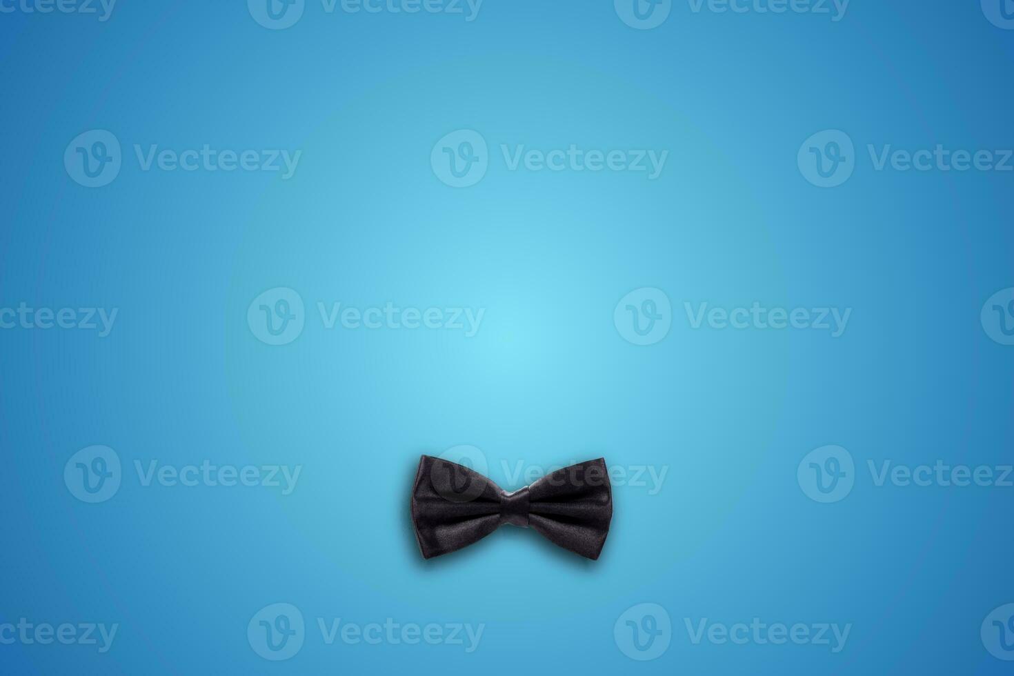 Black gentleman bow tie men fathers dad concept on blue background photo