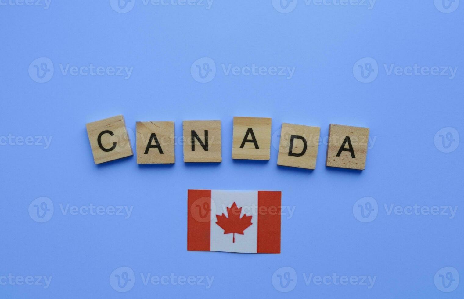 August 7, Civil Holiday in Canada, Civic Day Holiday, flag of Canada, minimalistic banner with wooden letters on a blue background photo