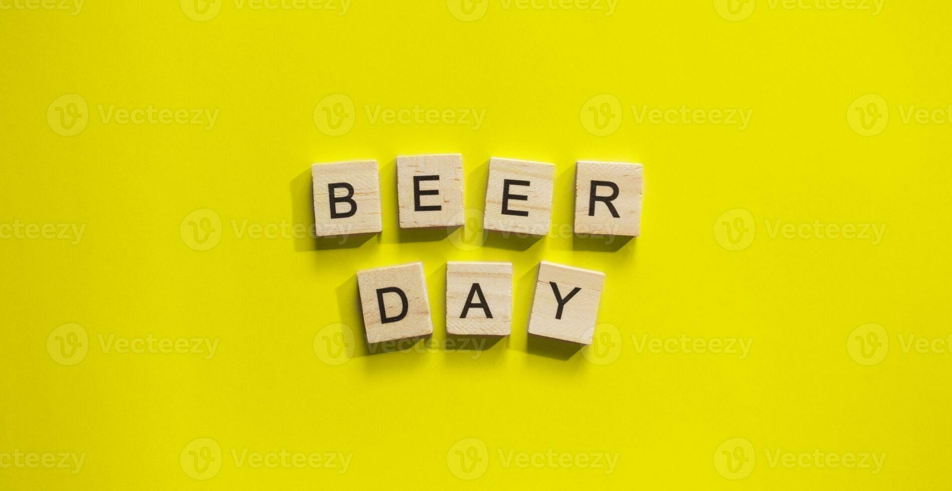 August 4, International Beer Day, minimalistic banner with the inscription in wooden letters Beer Day photo