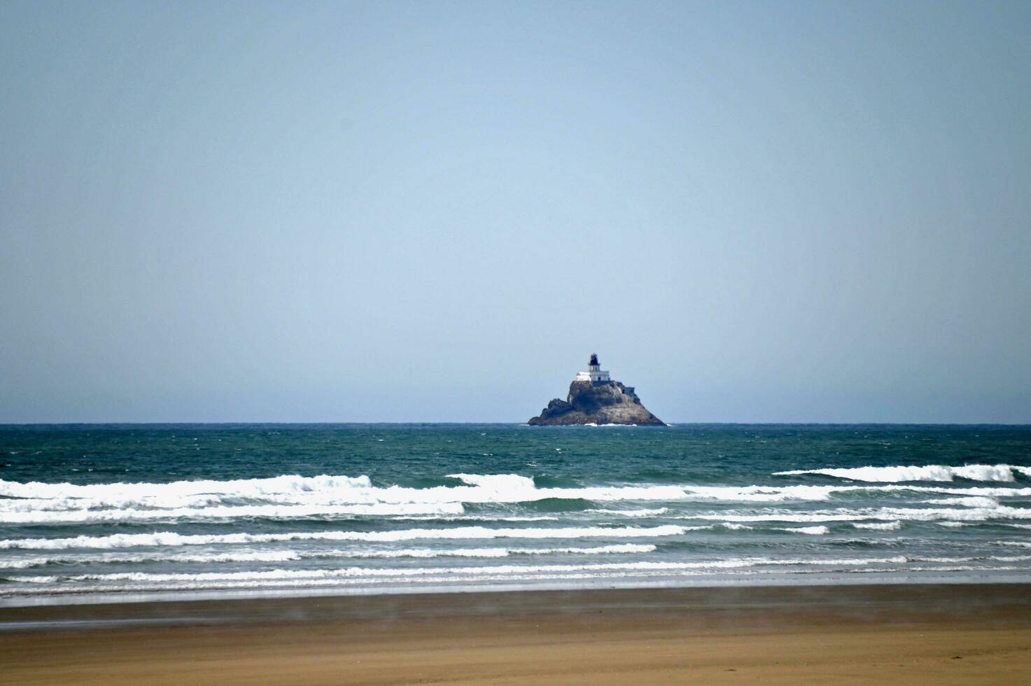 The lighthouse at Canon Beach Oregon photo