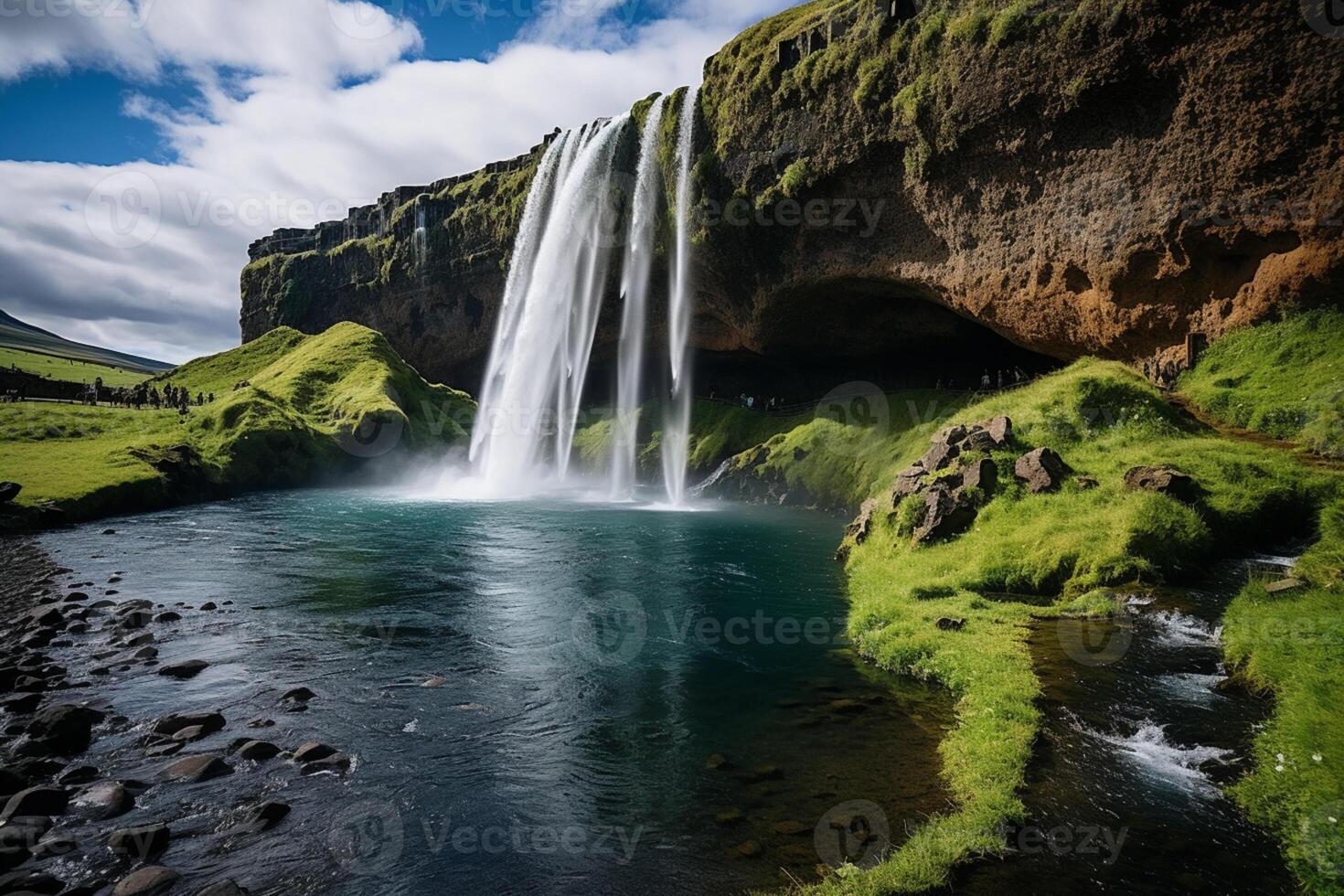 A radiant sunset paints Seljalandsfoss waterfall in hues of tranquility photo