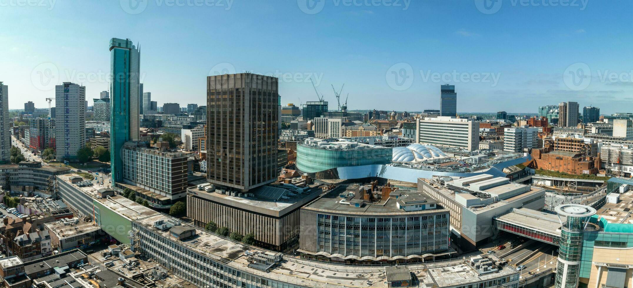 View of the skyline of Birmingham, UK including The church of St Martin photo