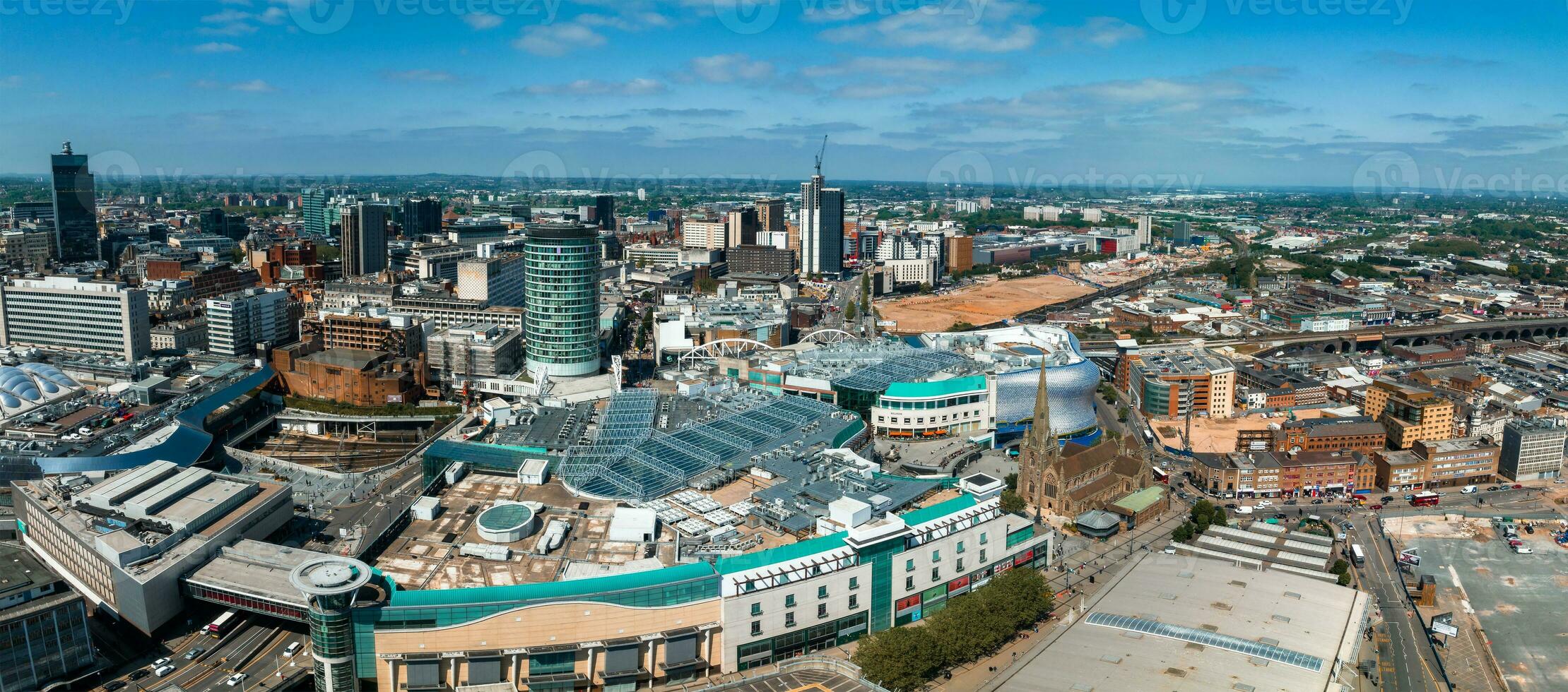 View of the skyline of Birmingham, UK including The church of St Martin photo