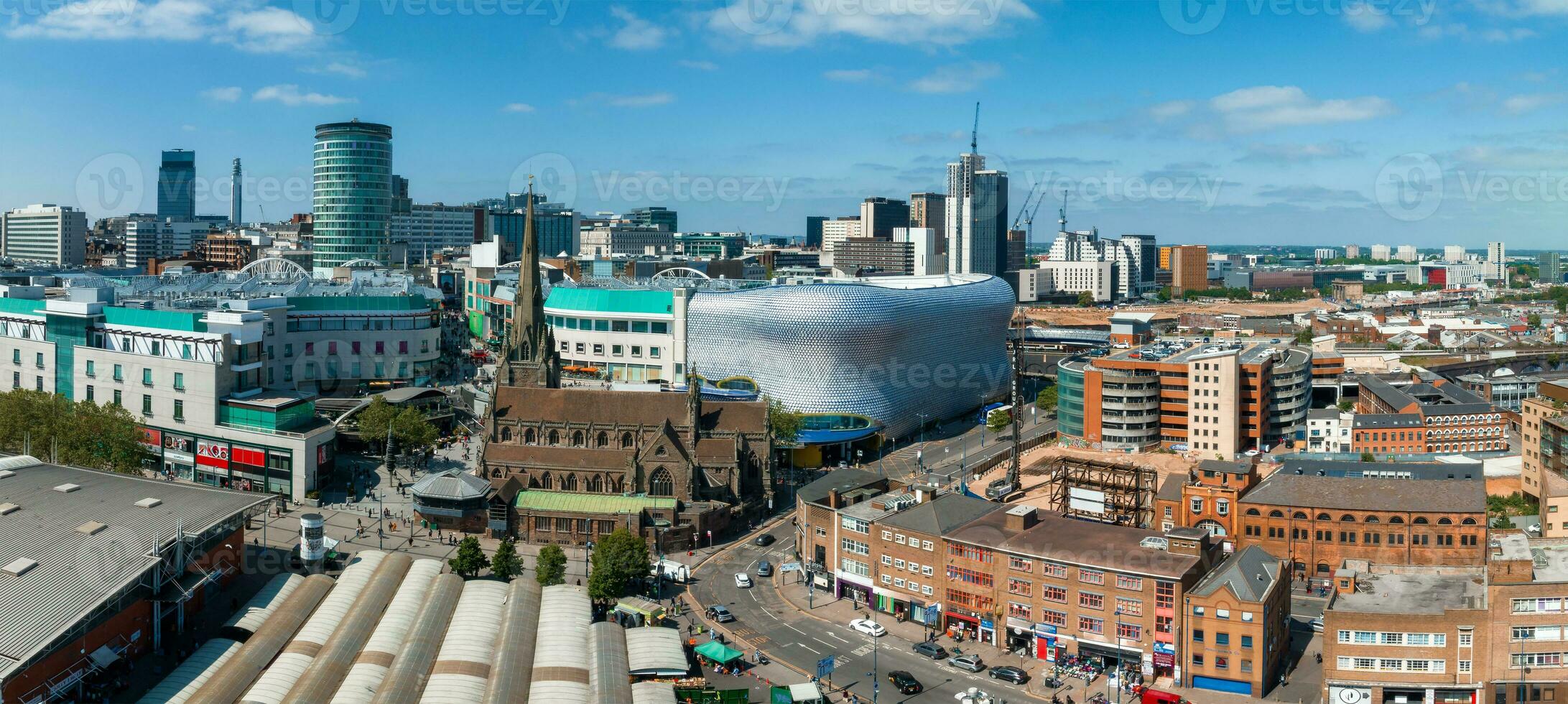 View of the skyline of Birmingham, UK including The church of St Martin photo