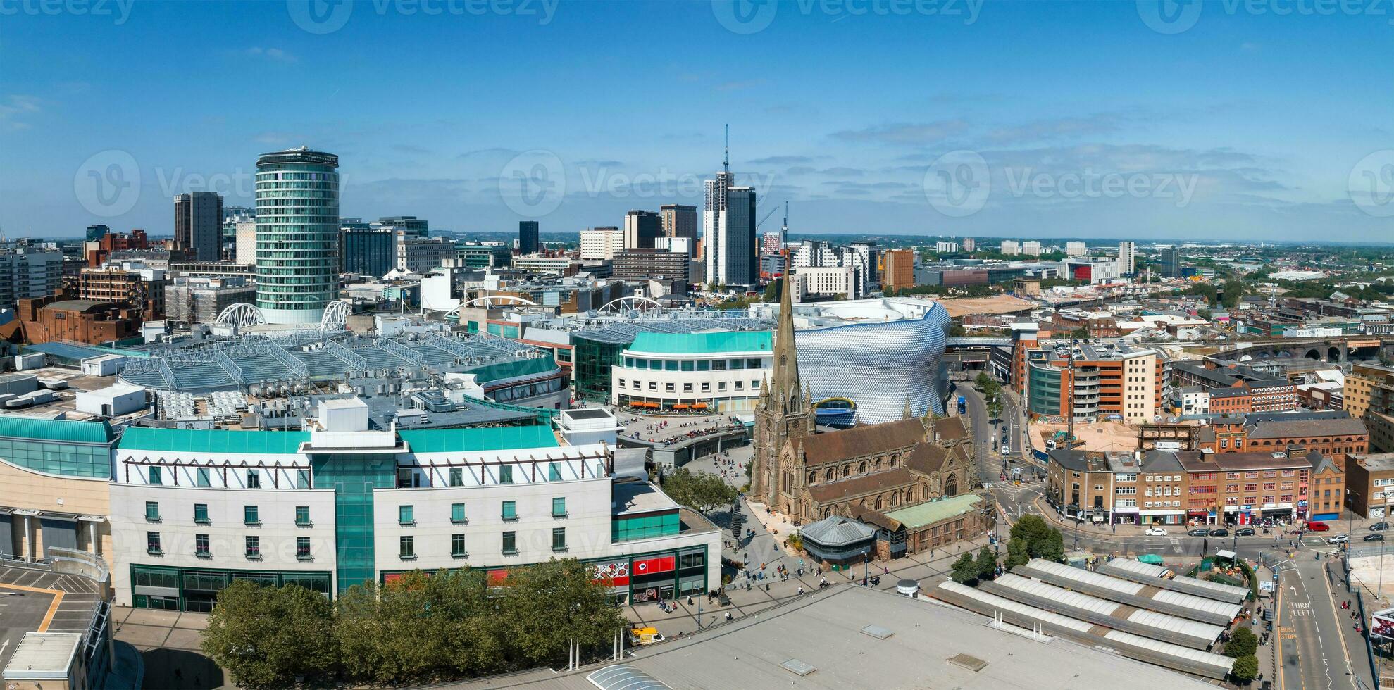 View of the skyline of Birmingham, UK including The church of St Martin photo
