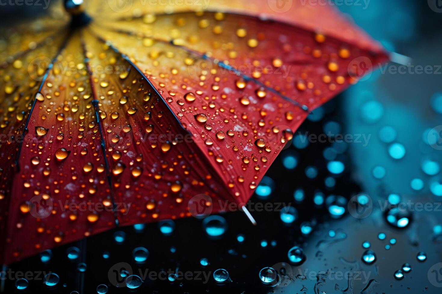 Colorful umbrella contrasts with a background of splashing raindrops photo