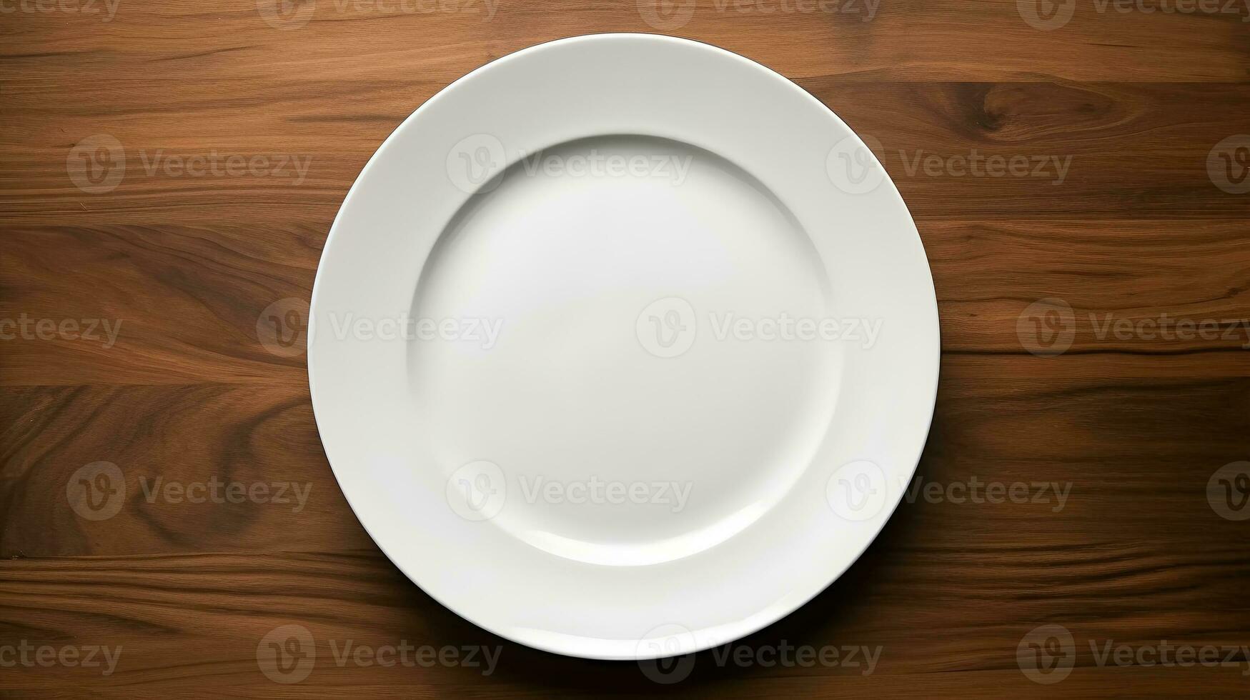 a white plate on wooden background photo