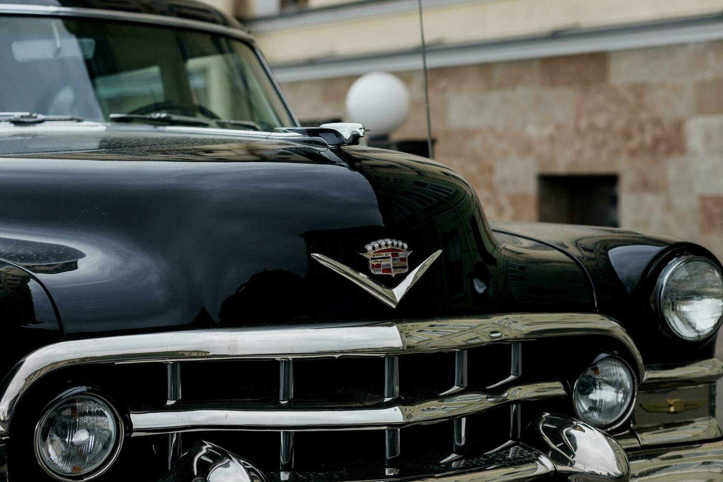 Minsk, Belarus, June 2023 - Classic Cadillac car parked at town. photo