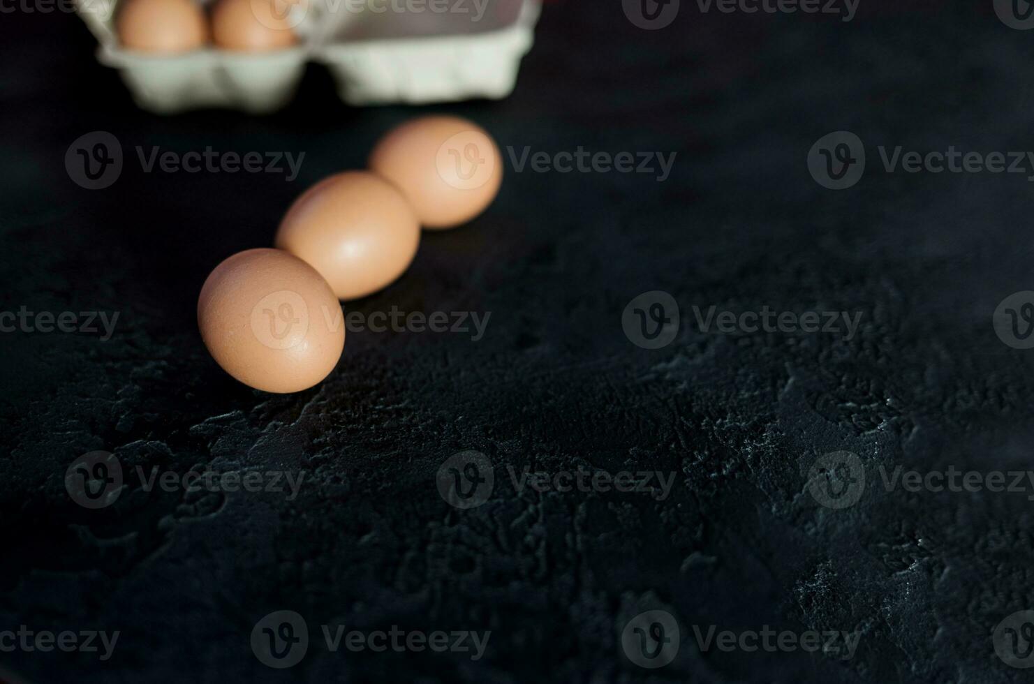 group of raw eggs photo