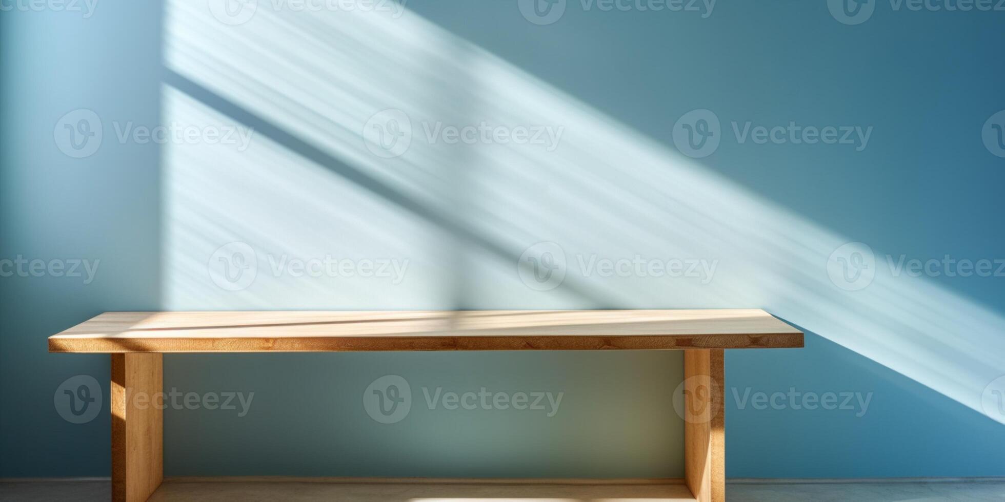Wooden table and sun light blue wall copy space background, photo