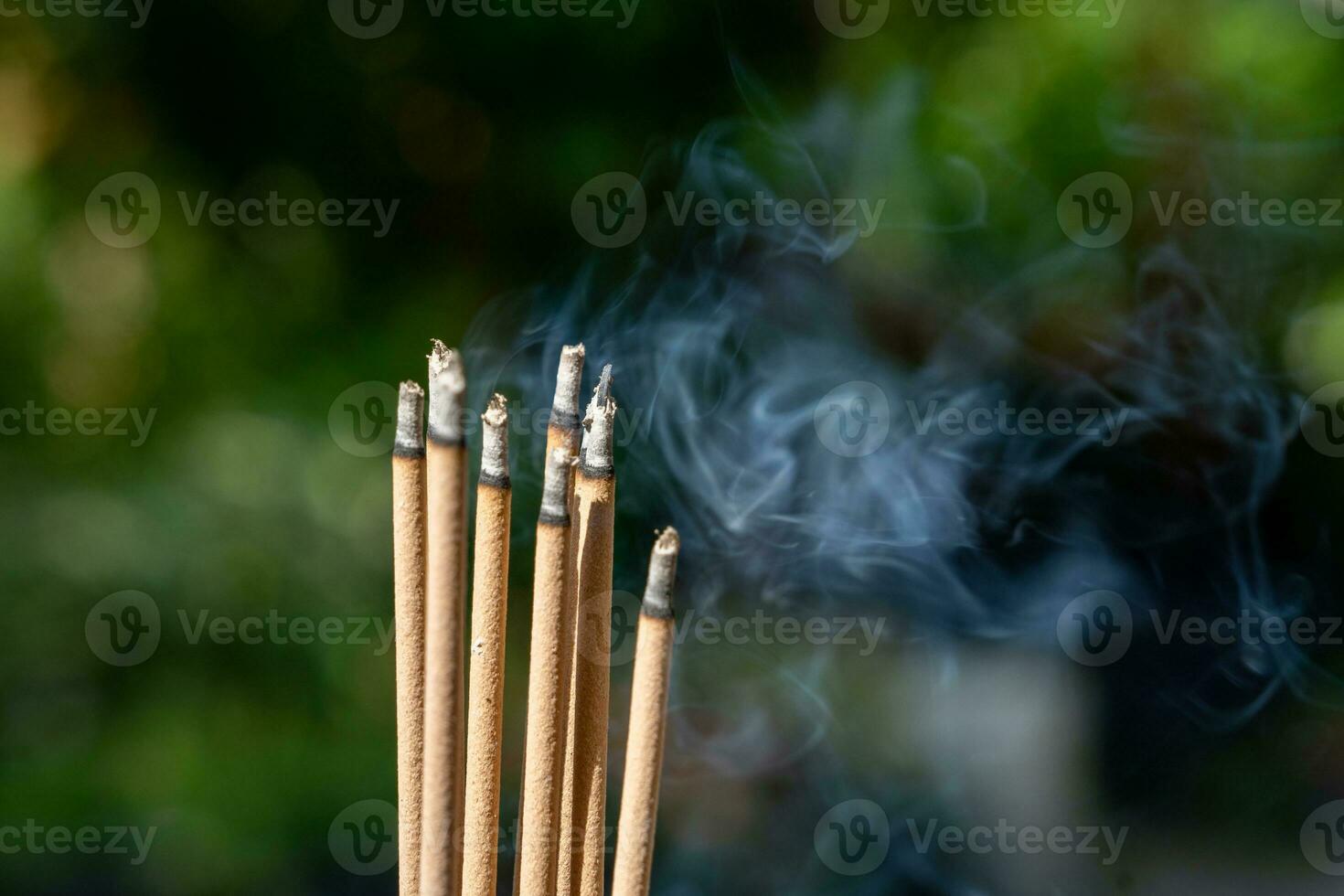 Incense sticks and smoke from incense burning. With copy space for text. photo