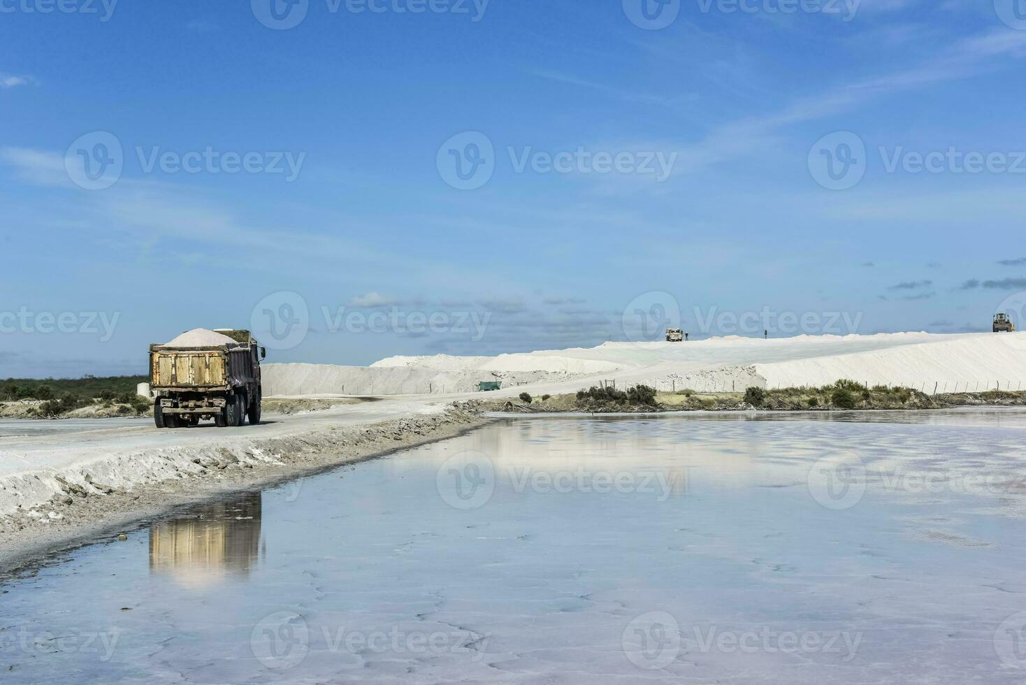 Extraction of raw material salt, from an open pit mine, La Pampa, Argentina photo