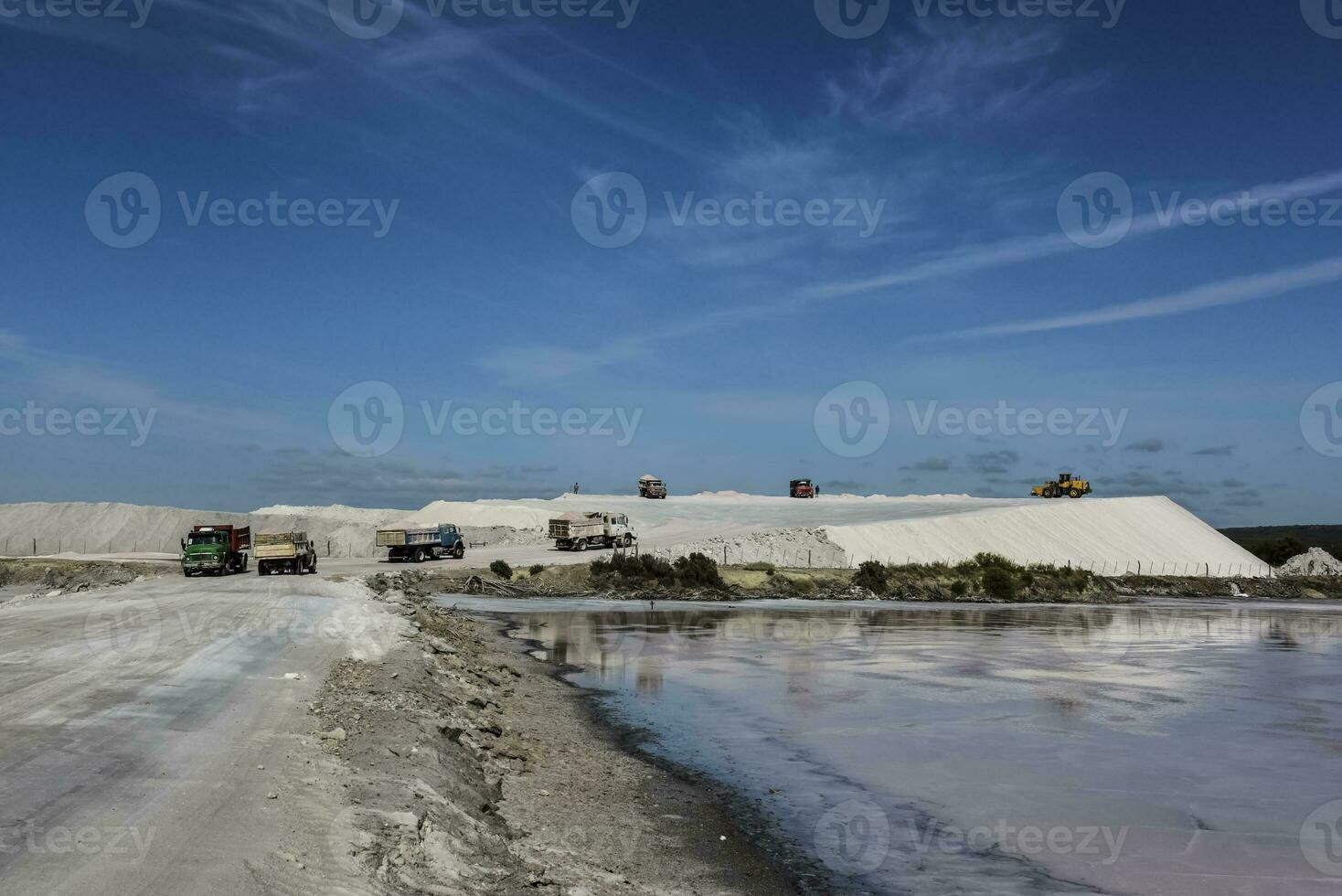 Extraction of raw material salt, from an open pit mine, La Pampa, Argentina photo