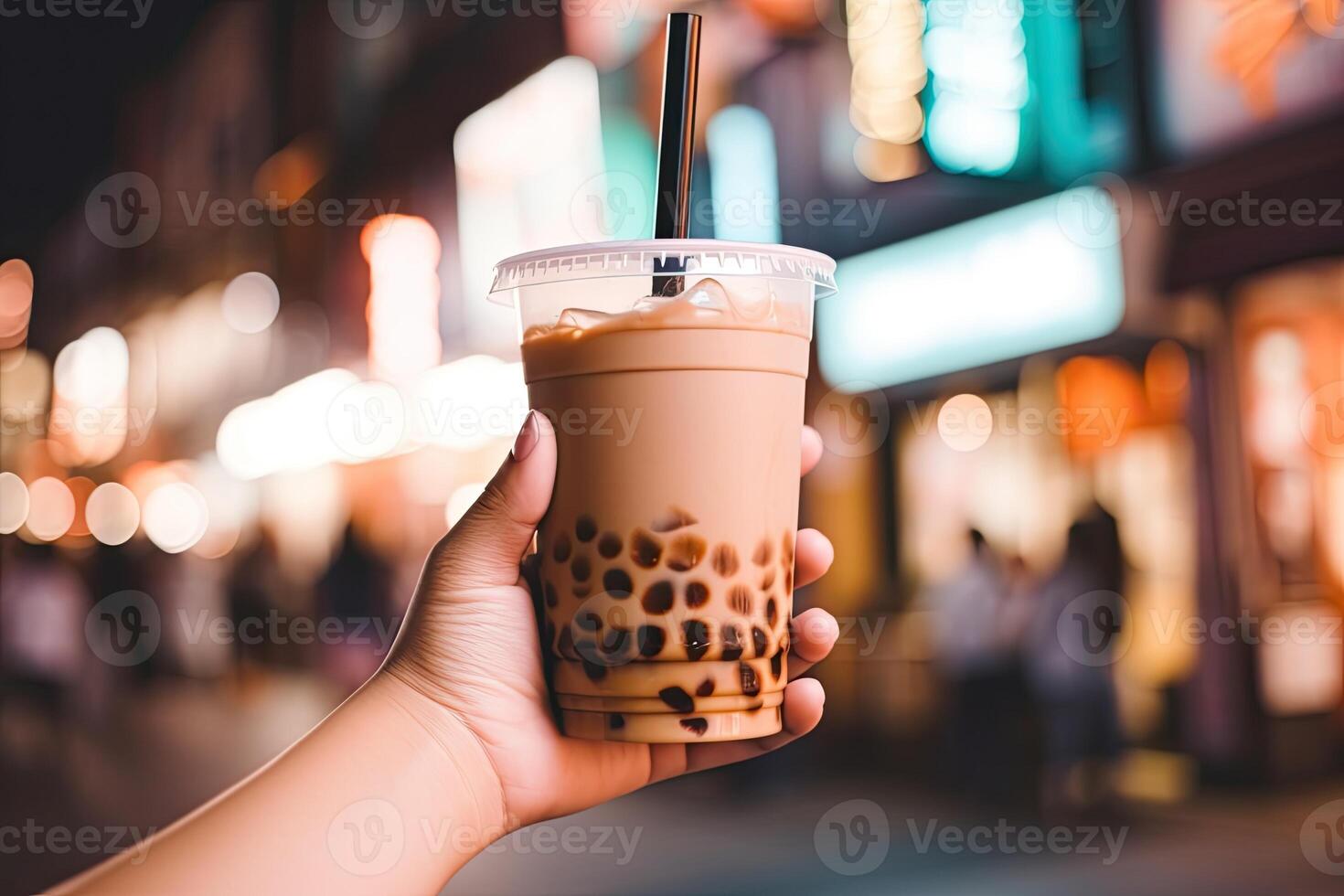 illustration of hand holding Taiwan milk tea and blurry background photo