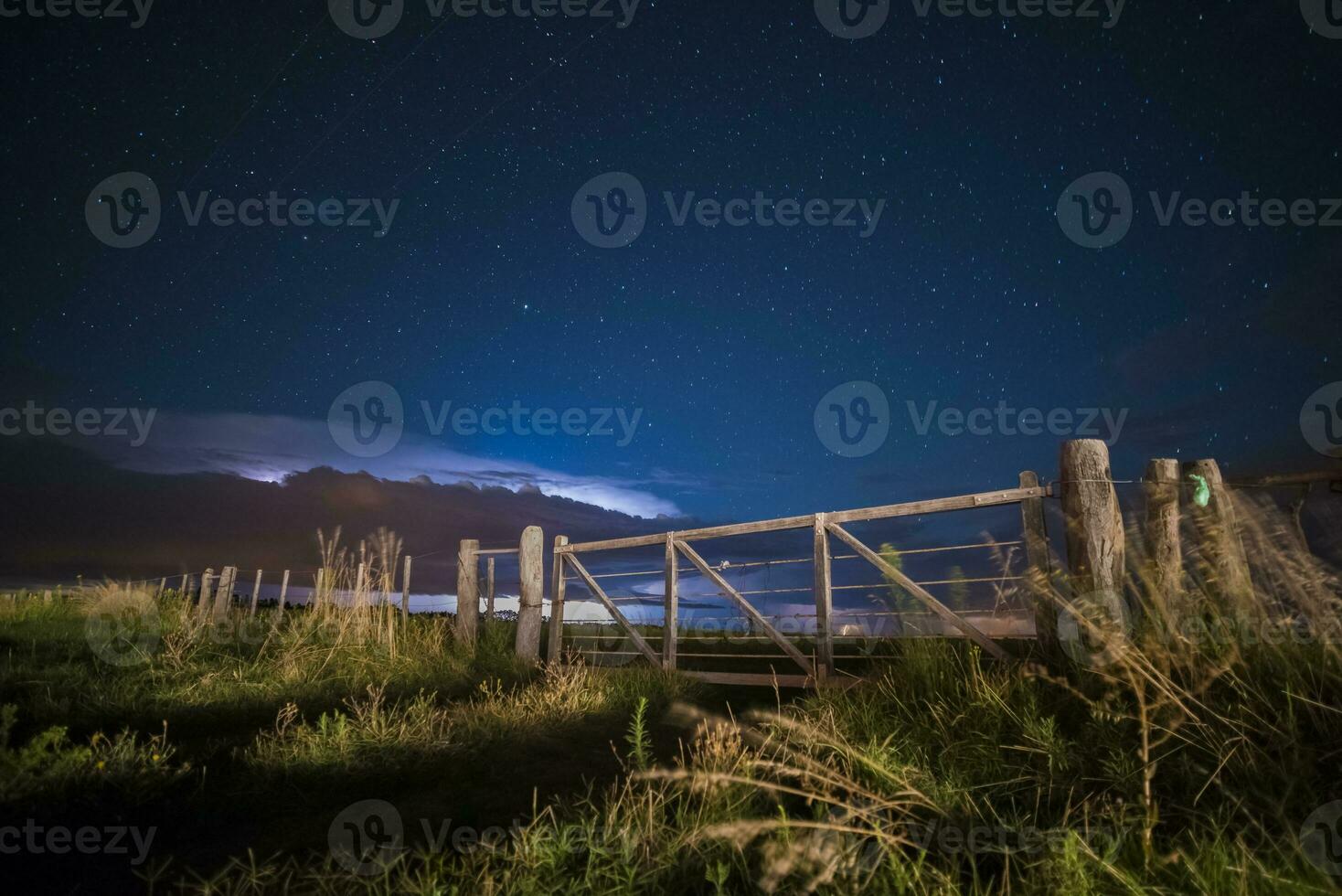 Rural Gate night landscape, and stars, La Pampa Province, Patagonia, Argentina photo