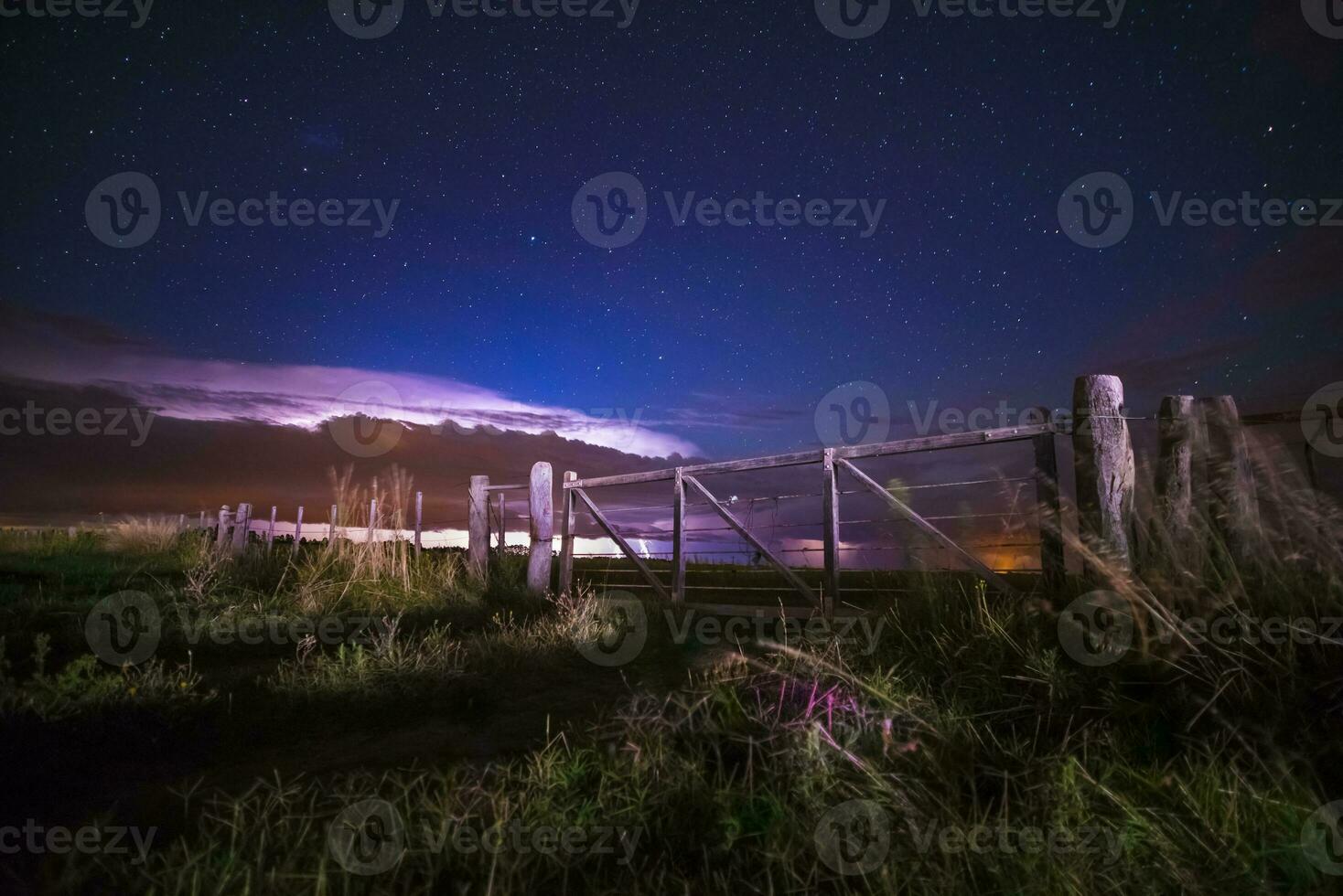 Rural Gate night landscape, and stars, La Pampa Province, Patagonia, Argentina photo