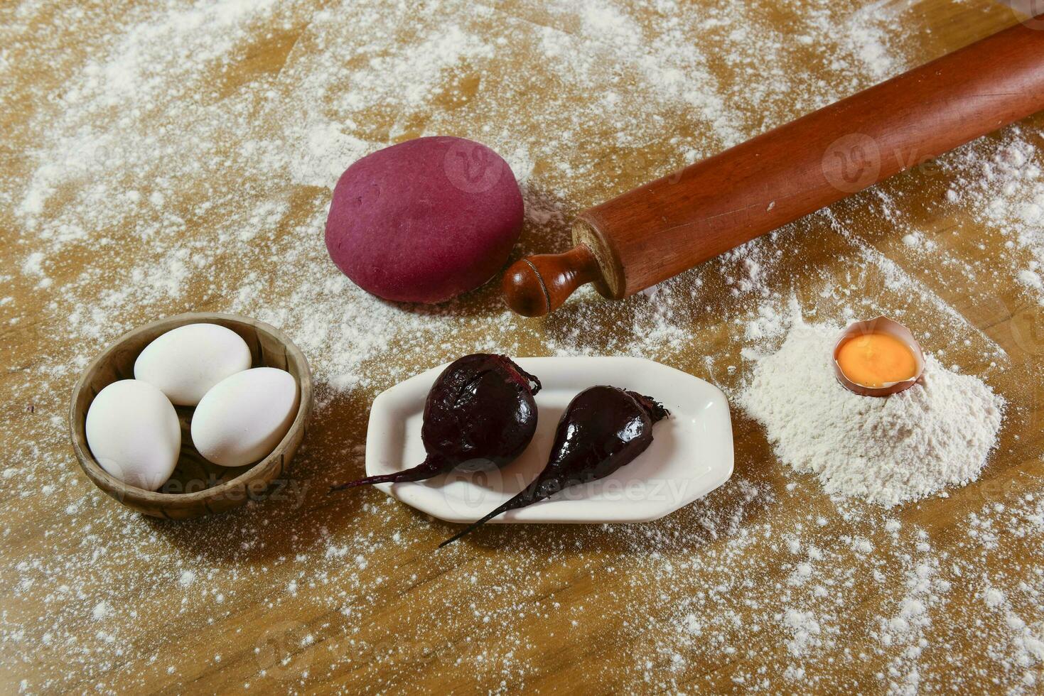 Purple dough bun for noodles with ingredients on the table. photo
